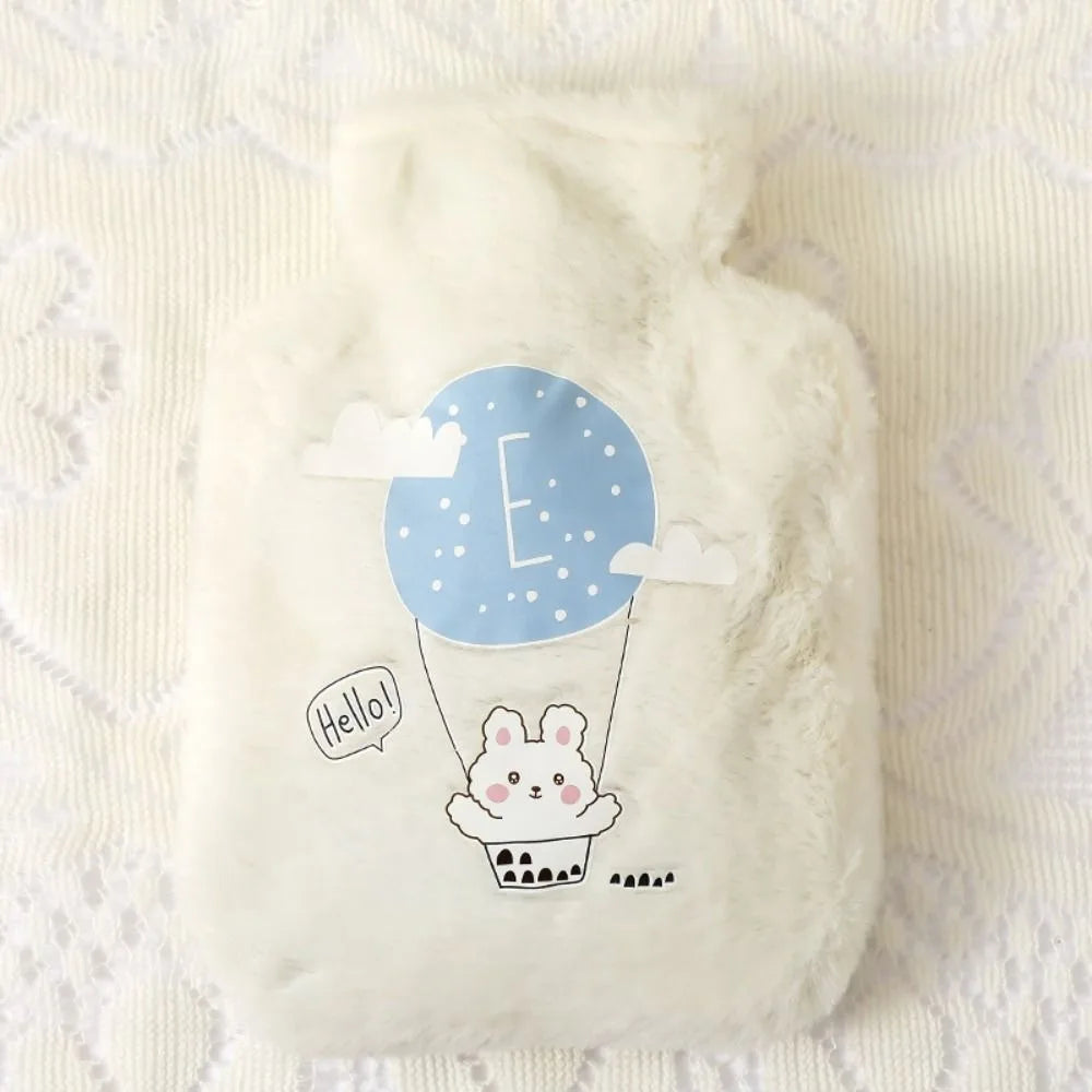 Bouillotte enfant en peluche blanche, motif lapin en montgolfière